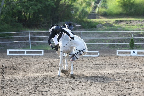 Unknown unidentified rider fall off her horse © acceptfoto