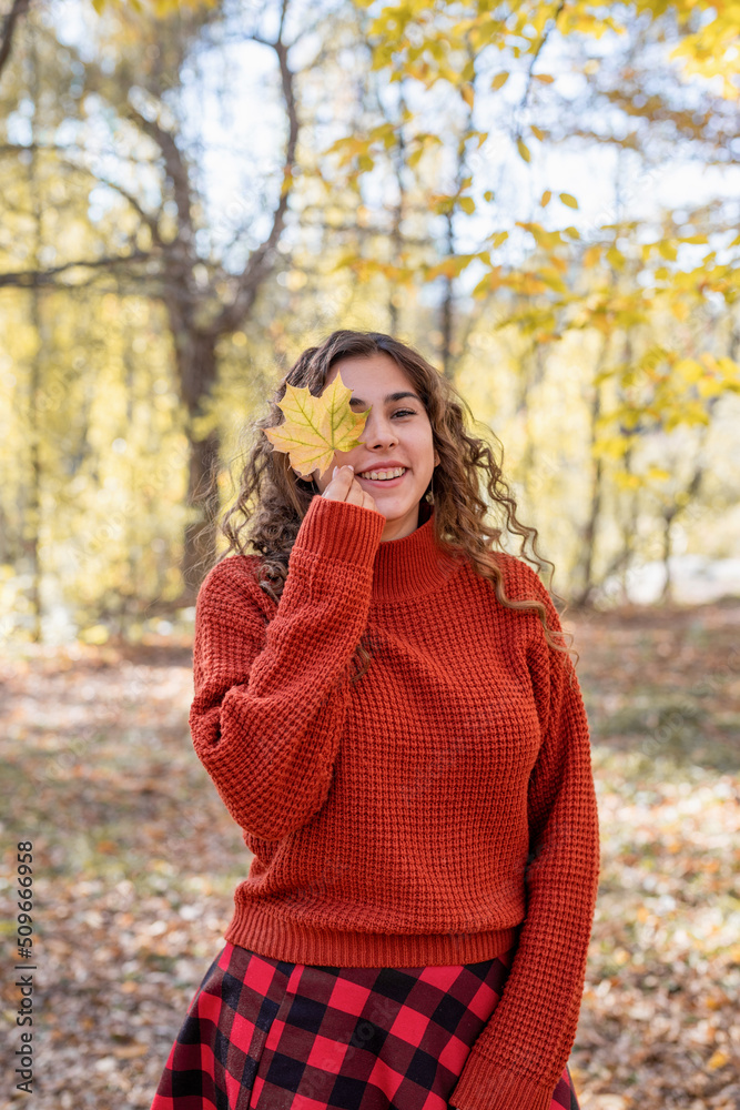 young happy woman walking in autumn forest young happy woman walking in autumn forest
