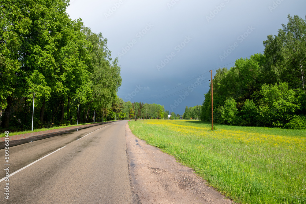 Fototapeta premium Path and road near the river and forest