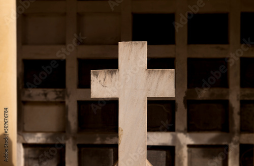 Closeup of religious cross in cemetery