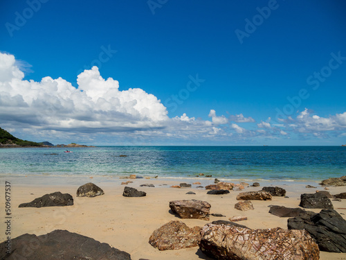 Landscape summer view  tropical sea beach rock blue sky white sand background calm Nature ocean Beautiful wave crash splashing water travel "Nang Ram Beach" East thailand Chonburi Exotic horizon.