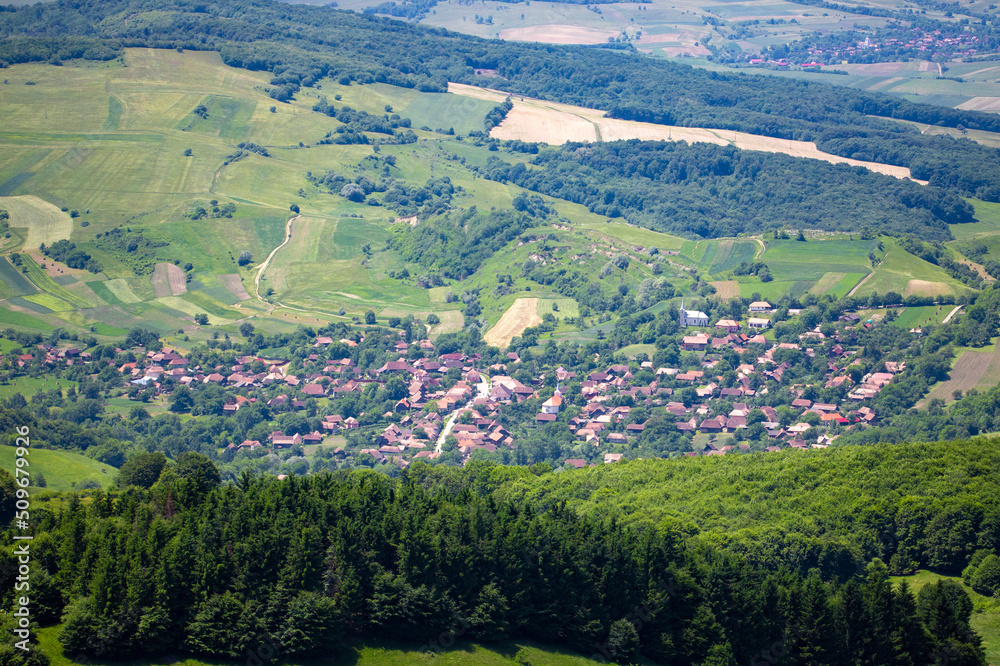 A small village between hills in Transylvania - Romania