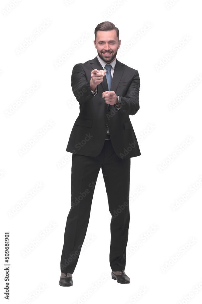 full length .smiling handsome businessman pointing at you full length .smiling handsome businessman pointing at you