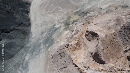 An aerial view of the piles of fine stone in the quarry. Fine stone is used in the production of quality asphalt for roads and for the preparation of concrete used in construction