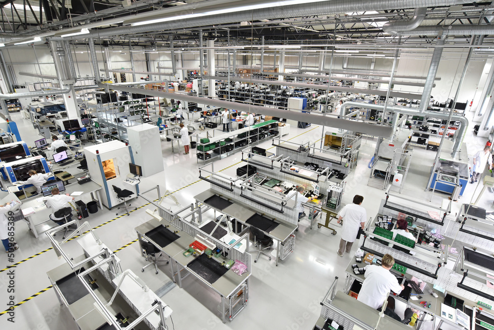 modern industrial factory for the production of electronic components - machinery, interior and equipment of the production hall modern industrial factory for the production of electronic components - machinery, interior and equipment of the production hall