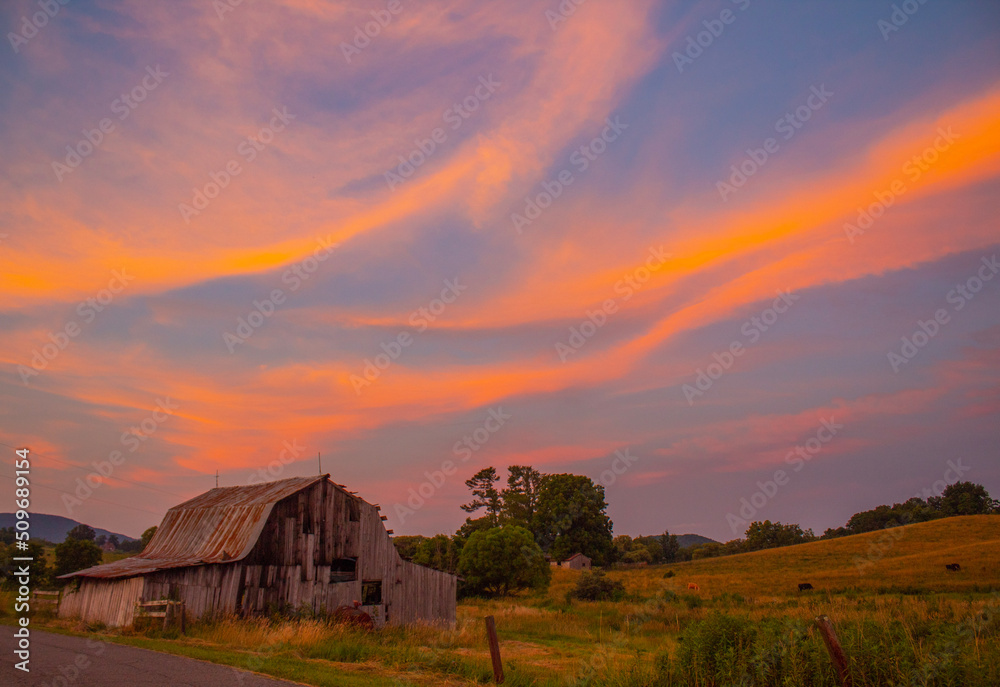 sunset over the barn sunset over the barn
