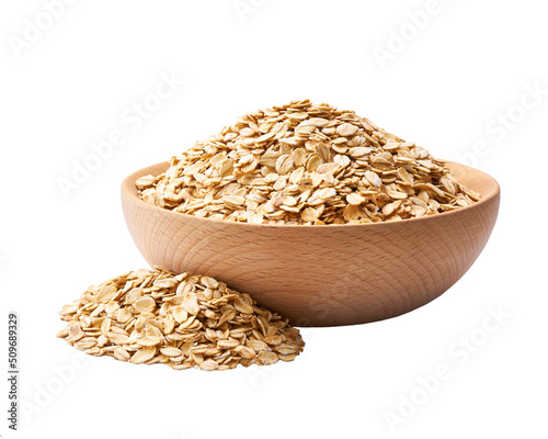 Organic oatmeal flakes in a wooden bowl isolated on white background.