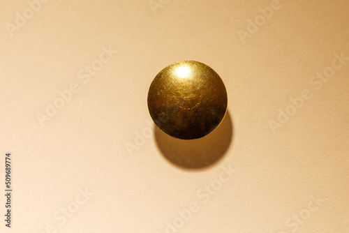 Obraz na plátně Golden Thumb Tack head