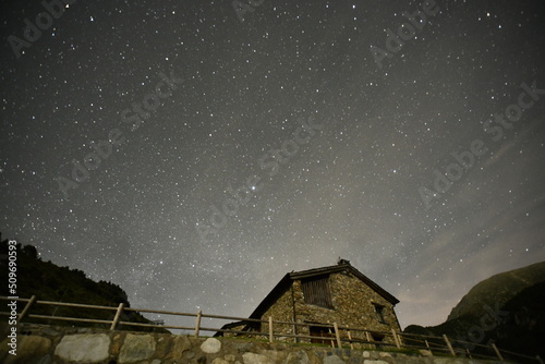 House with milly way and starred sky