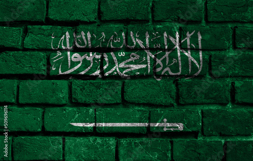 Saudi Arabia flag painted on brick wall. National country flag background