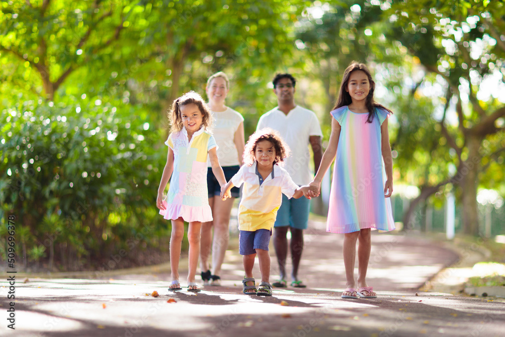 Family in summer park. Parents and kids outdoor. Family in summer park. Parents and kids outdoor.