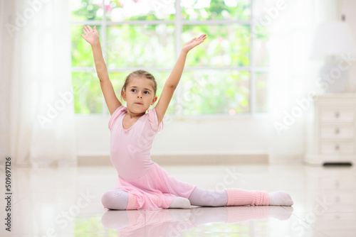 Baby ballet. Little ballerina girl in dance class.