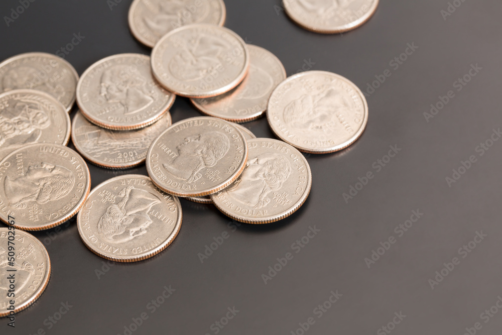 Coins on a black background- Quarters Coins on a black background- Quarters