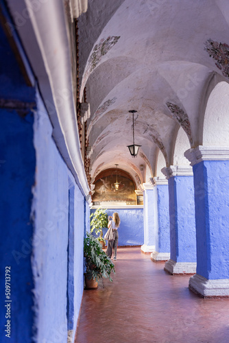 tourist photographing the corridors of the cloister of the Santa Catalina monastery © Diana Guevara