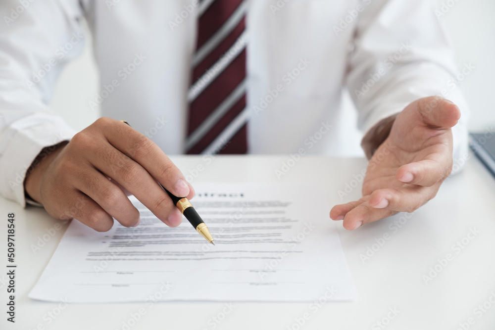 Close up businessman signing contract, partnership agreement, making deal Close up businessman signing contract, partnership agreement, making deal