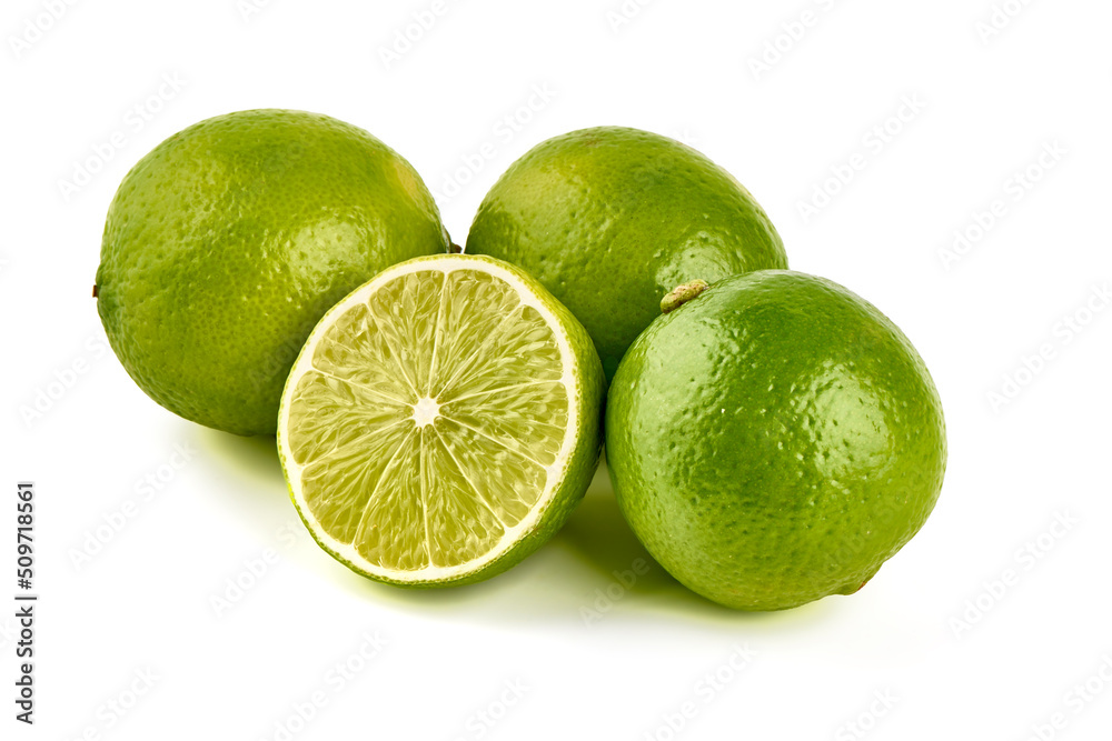 Green lime with cut in half, isolated on white background. Green lime with cut in half, isolated on white background.
