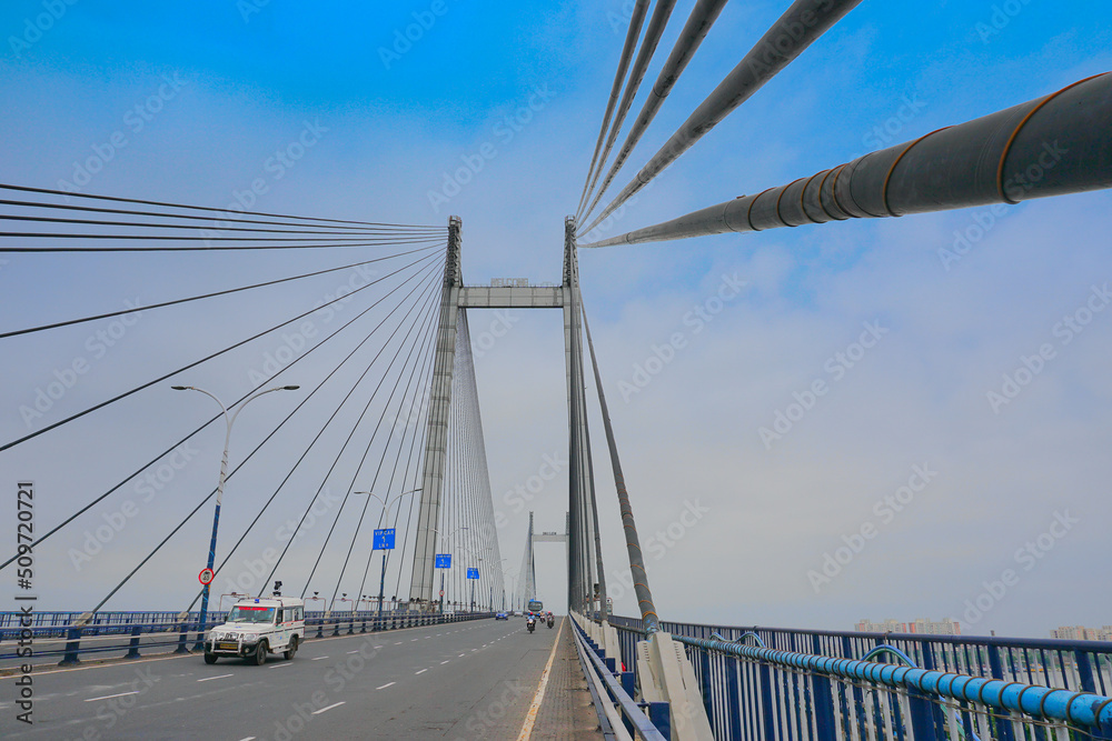 Kolkata, West Bengal, India - 21st June 2020 : Cables of 2nd Hoogly Bridge, Kolkata, West Bengal, India. Blue sky in the background.