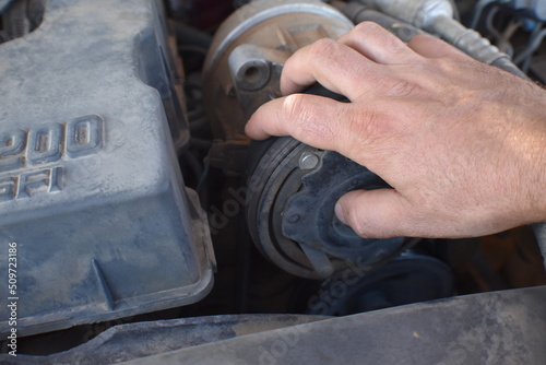 mechanic working on engine