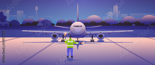 aviation marshaller signaling near aircraft air traffic controller airline worker in signal vest professional airport staff