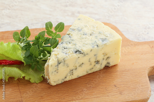 Blue cheese piece over board