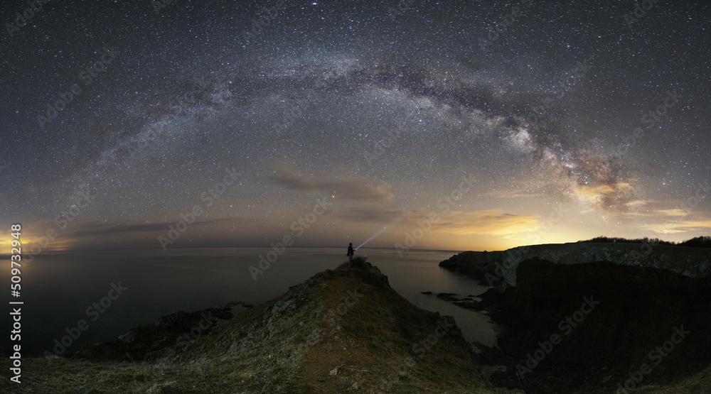 The arc of milky way over black sea.