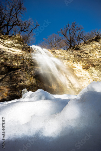 Waterfall in winter season.