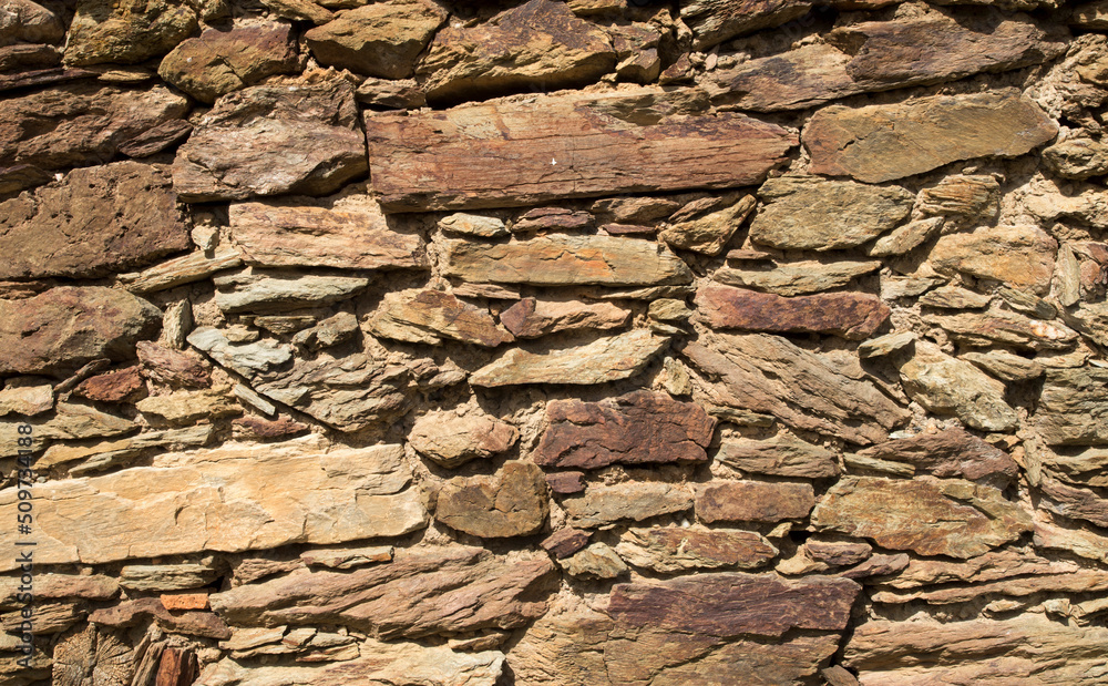 Fototapeta premium Old stone wall close up