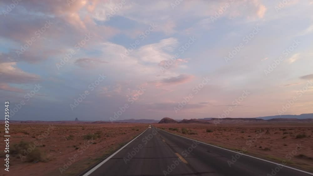Driving Plate Monument Valley Scenic Drive Highway 163 Dusk Northbound Multicam Set 03 Rear View Arizona Utah Southwest USA