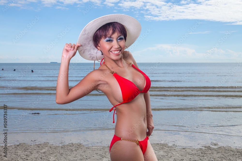 Sexy asian red bikini female lady model having a great holiday by a beach and posing  happily with different enjoy look and moment, suitable for glamour travel summer ads 