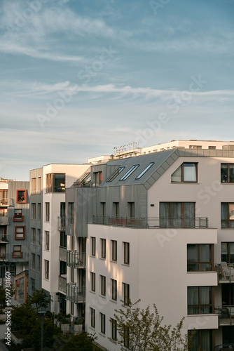 Modern residential apartment house complex, outdoor facilities concept © AlexGo