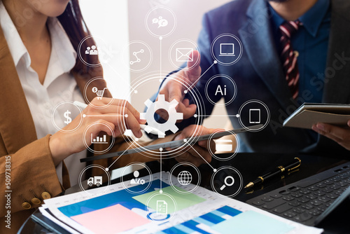 Business team partnership meeting concept. Business hand using laptop, tablet and smartphone  in office. Digital marketing media mobile app in virtual icon screen