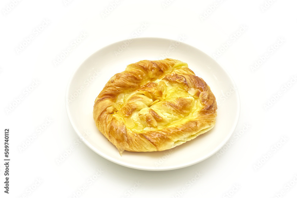 Custard pie on white plate. isolated on white background Custard pie on white plate. isolated on white background