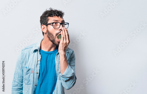 Person with bad breath problem, Concept of person with halitosis and bad breath, a guy with bad breath and halitosis problem photo
