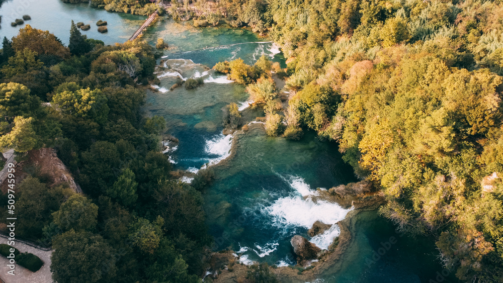 National Park Krka and Cascade of Waterfalls on River Krka. Croatia. Aerial view. Nature background National Park Krka and Cascade of Waterfalls on River Krka. Croatia. Aerial view. Nature background