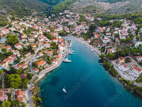 Beautiful Splitska harbour on island Brac Croatia. Aerial view. Crystal blue water. Adriatic sea