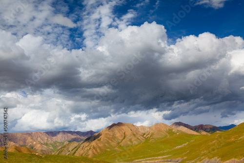 Clouds over mountains in the Himalaya foothills, Qinghai province China photo
