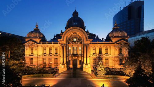 Aerial drone view of the CEC Palace at night in Bucharest, Romania