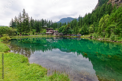 View of Laux lake, small alpine lake near Usseaux, in Val Chisone, Piedmont, Italy © Marco