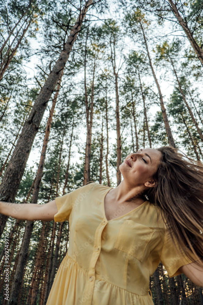 Midsummer solstice ritual. Woman with long hair dance on nature background Midsummer solstice ritual. Woman with long hair dance on nature background