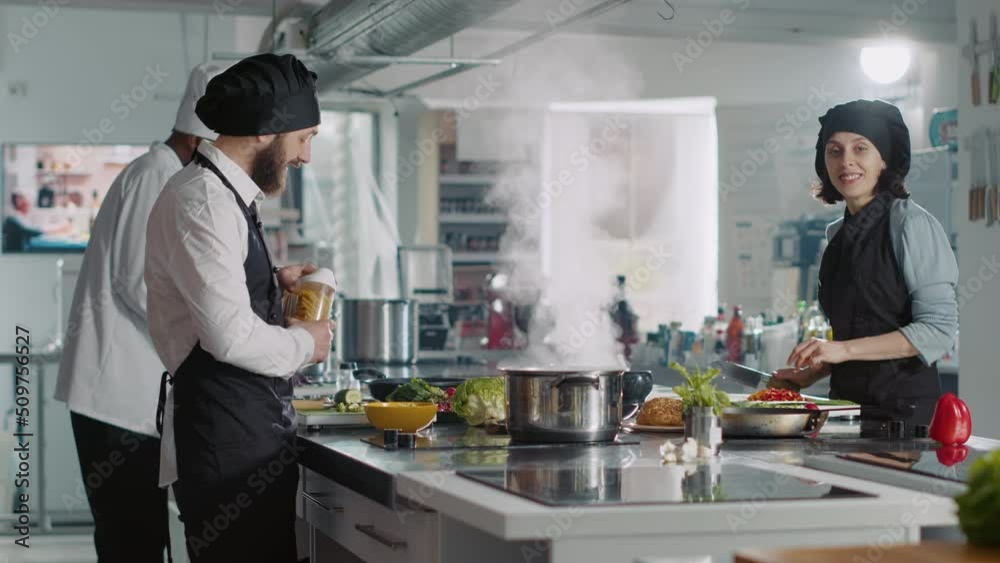 POV of male chef recording cooking show on television program, using camera to film gastronomy video for culinary content. Vlogging delicious meal preparations on professional cuisine TV. POV of male chef recording cooking show on television program, using camera to film gastronomy video for culinary content. Vlogging delicious meal preparations on professional cuisine TV.