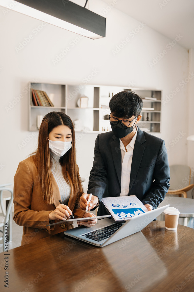Business team meeting present.professional investor working with Finance managers task. with laptop smart phone and digital tablet Business team meeting present.professional investor working with Finance managers task. with laptop smart phone and digital tablet