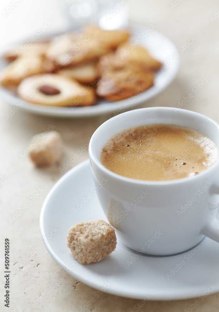 Cup of Coffee on bright stone background. Close up. Cup of Coffee on bright stone background. Close up.