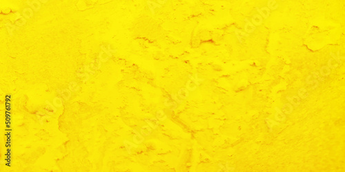 Abstract texture of yellow painted grunge concrete wall, Creative bright crumpled yellow paper texture, watercolor painting on shinny grunge decorative painted old paper texture.