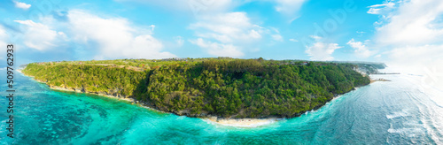 Aerial view, stunning panoramic view of the Green Bowl Beach bathed by a turquoise water during a sunny day, Green Bowl Beach, South Bali, Indonesia