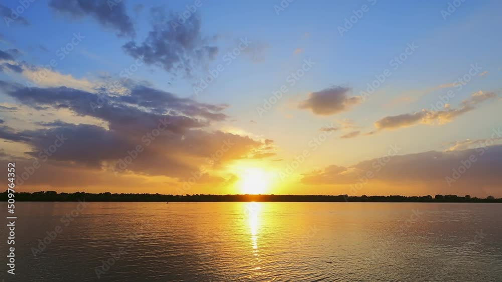 Majestic sunset. Time-lapse of the moving clouds in the sky. Amazing light of nature cloudscape sky and Clouds moving away rolling colorful. Majestic sunset. Time-lapse of the moving clouds in the sky. Amazing light of nature cloudscape sky and Clouds moving away rolling colorful.