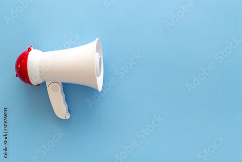 White loudspeaker for announcing hiring or advertising. Megaphone device