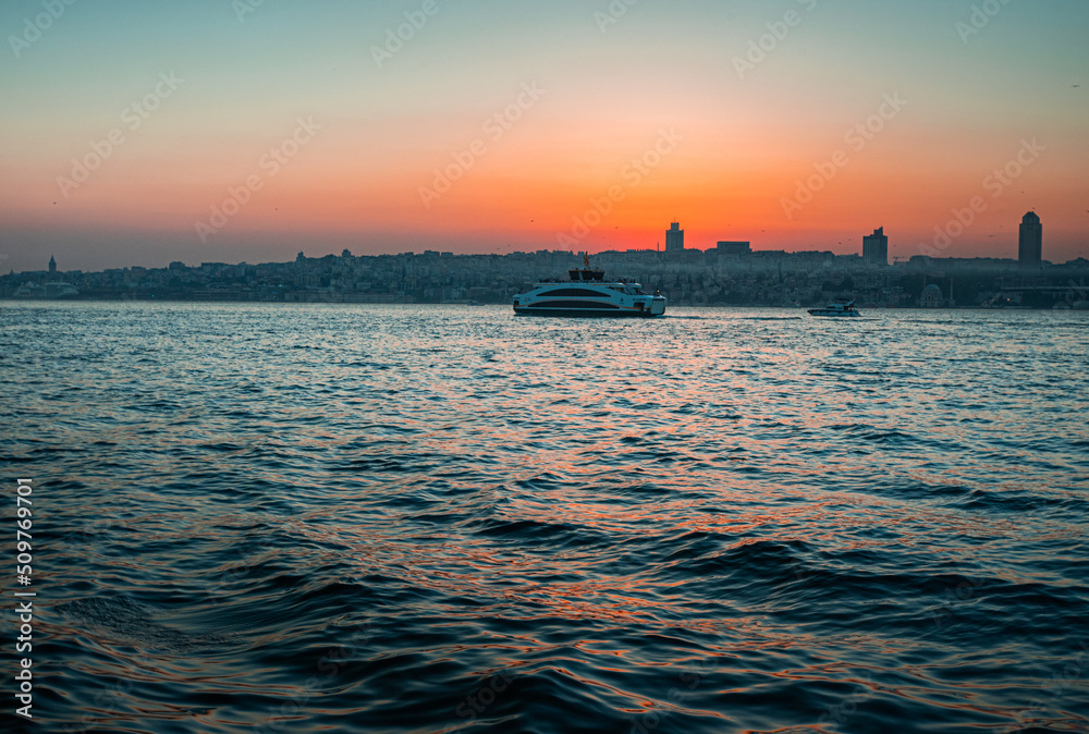 sunset over the Bosphorus strait in Istanbul city