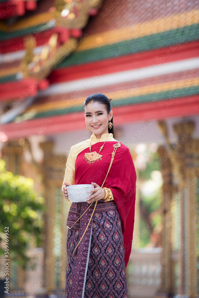 Portrait cheerful young asian woman with Songkran festival, Thailand. Thai New Year's Day. Thailand traditional.Family Day in April Portrait cheerful young asian woman with Songkran festival, Thailand. Thai New Year's Day. Thailand traditional.Family Day in April
