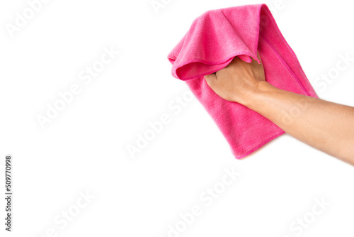 Abstract male hand holding pink microfiber cleaning cloth on white. Background copy space for add text or art work design.