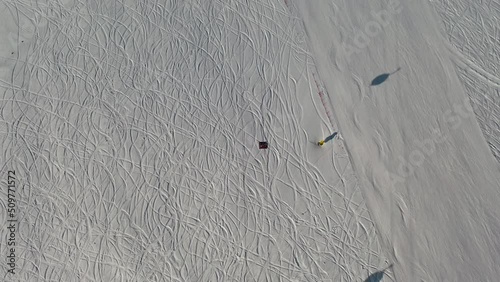 Aerial view snow mountain range landscape clouds in background 4k winter drone footage Ski resort. Erciyes. Turkey. Volcano. Ropeway. aerial truck left. High quality 4k footage